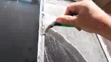 Man turns glass window from a soapy mess to a spectacular spot for experiencing sunrise