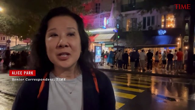 Spectators Stay Dry By Watching 2024 Paris Olympics Opening Ceremony in Parisian Cafes