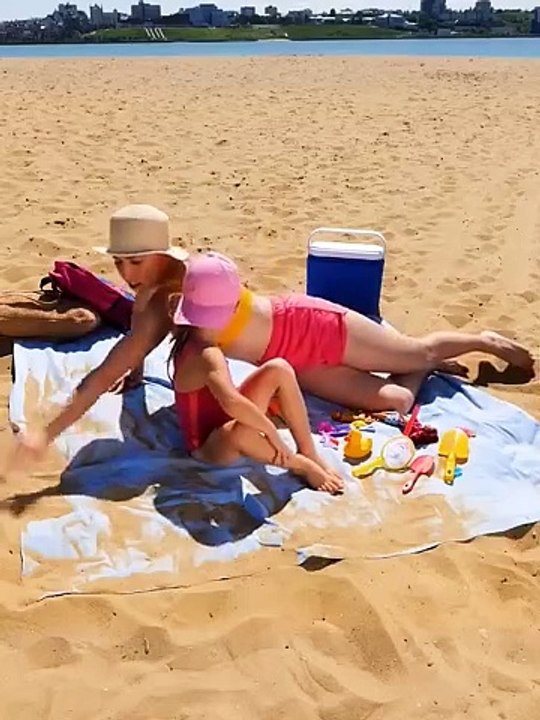 "Beach Smart: Innovative Hacks to Keep Your Sitting Sheet Sand-Free and Protect Your Gadgets"