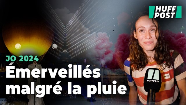 Pour ces spectateurs, la cérémonie d’ouverture des JO valait la peine d’être trempé