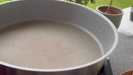 Woman celebrates sunny day by performing her Ramen magic in the garden