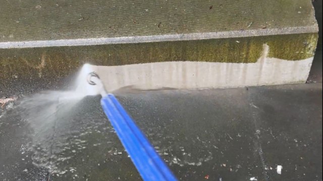Pressure washing revives old concrete stairs in a satisfying manner