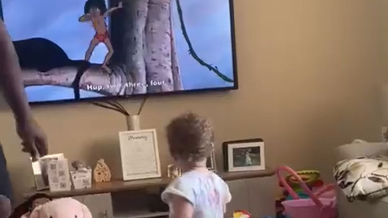 Adorable toddler marching along to The Elephant...