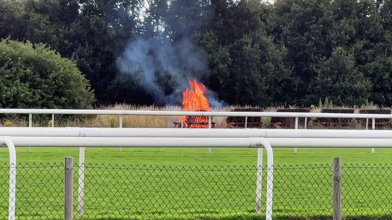 Fire crews tackle flames as fence set ablaze at Doncaster Racecourse