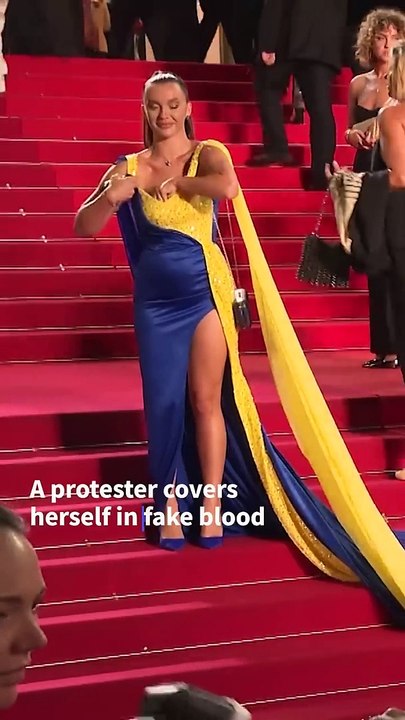 Protester pours fake blood on herself at Cannes Film Festival _ AFP _shorts