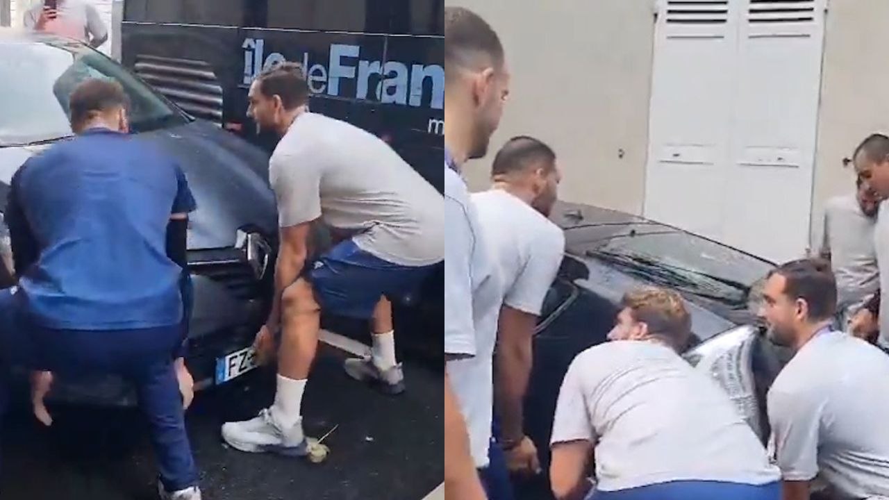 Greek Olympic water polo team get off bus - to lift parked cars out of way