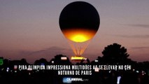 Pira olímpica impressiona multidões ao se elevar no céu noturno de Paris