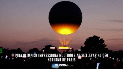 Pira olímpica impressiona multidões ao se elevar no céu noturno de Paris
