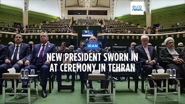 Iran's new president sworn in, pledges to fight economic sanctions