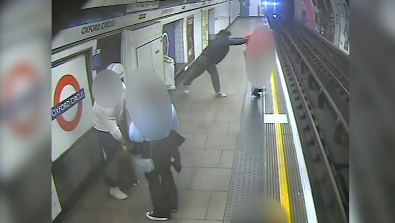 Moment homeless man pushes postman onto Tube tracks caught on CCTV