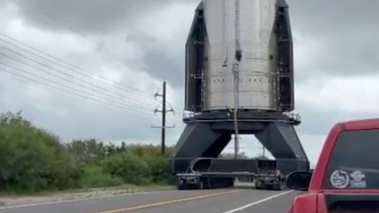 Huge space rocket rolls along road - forcing traffic to pull over