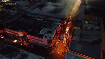 911 coordina asistencia de incendio en plaza comercial de Santiago