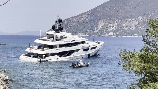 Moment luxury 150ft superyacht with five tourists on board starts sinking off Greek island