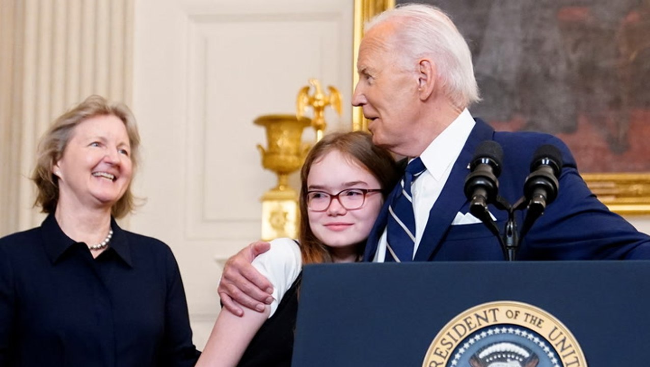 Biden sings happy birthday to released prisoner’s daughter as she wipes away tears in emotional moment