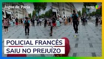 Policial entra em brincadeira de influencers brasileiros e quebra equipamento na Champs-Élysées