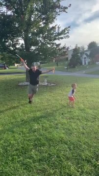 Father Falls While Playing Bubbles With Son