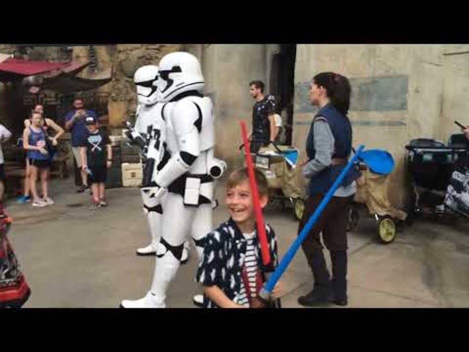 Boy Encounters People Dressed as Fictional Characters From Popular Movie