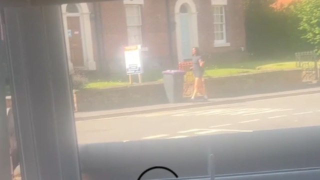 Girl girl enjoys dancing on the road as if no one is watching