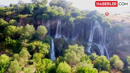 Aşırı sıcakların yaşandığı bugünlerde serinlemek isteyenler Girlevik Şelalesi'ne akın ediyor