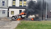 Car set alight after clashes between police and far-right rioters in Middlesbrough