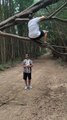 Woman Falls While Getting Off of Fallen Tree