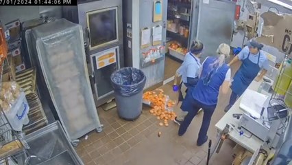 Guy Trips and Falls While Walking out of Walk-in Refrigerator