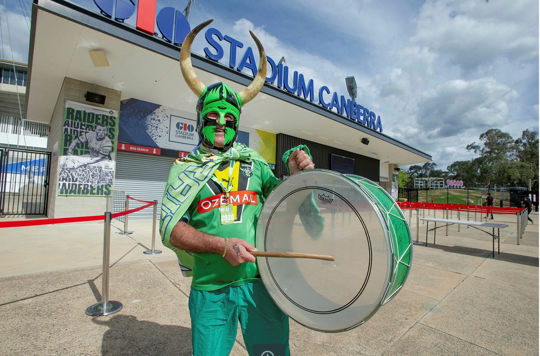 Raiders drummer Simon Tayoun surrounded by Bulldogs fans