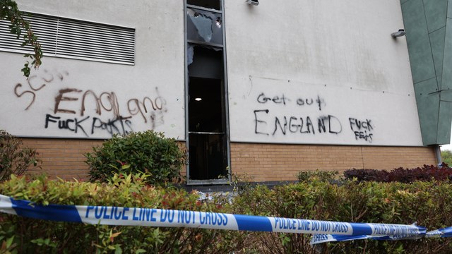 Police guard damaged Holiday Inn Express in Tamworth day after riots