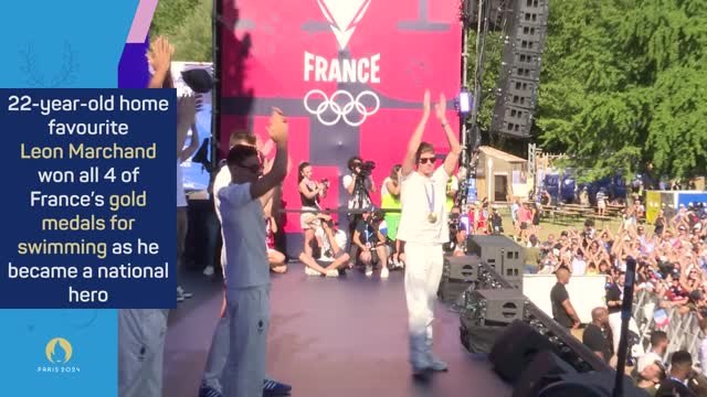 France team parades their medals in front of a packed out crowd