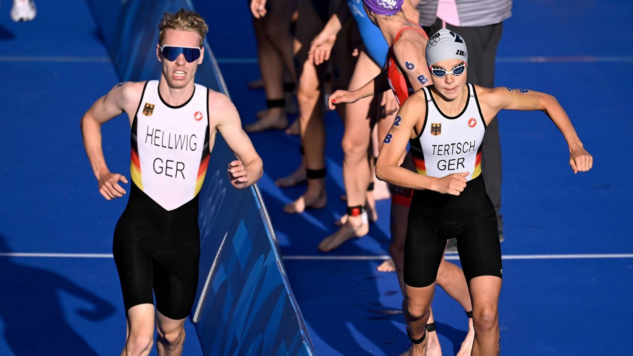 'Den eigenen Atem nicht gehört': Triathlon-Staffel feiert Gold im Champagner-Regen