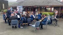 Watch a band play at Ramsey during an event to mark the 125th anniversary of the Manx Electric Railway's Laxey to Ramsey line