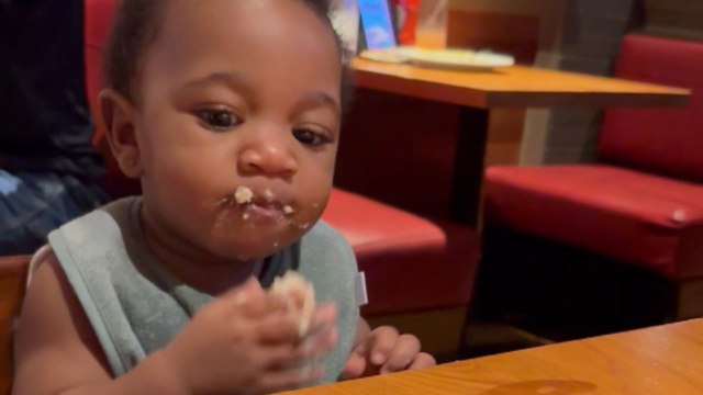 Little girl enjoys hot mashed potatoes during dinner with her mom