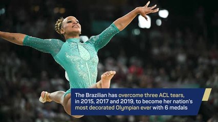 Andrade given hero's reception after beating Biles to gold