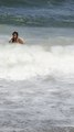 Woman Loses Wig After Powerful Wave Knocks Her Into Water at Beach