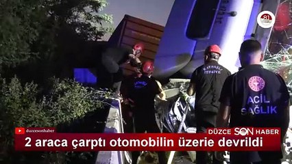 İki araca çarpan TIR otomobilin üzerine devrildi