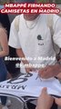 Mbappé firmando camisetas en Madrid