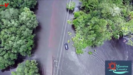 Watch the Rescue Operation for a Person Stranded in Flood Water After Storm Debby