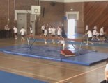 Woman Falls While Attempting to Jump on Gymnastics Beam