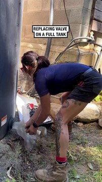 Replacing a valve on a full water tank! - the_ladyplumber