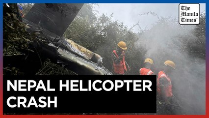 5 people killed in a helicopter crash in the mountains northwest of Nepal's capital