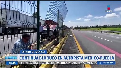 Continúa el bloqueo de campesinos en la autopista México-Puebla