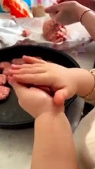 This baby deserves to be a super kitchen assistant 