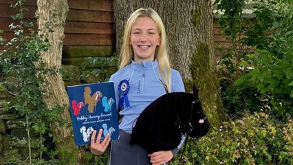 Girl competes in hobby horse competitions where she show jumps with stick pony