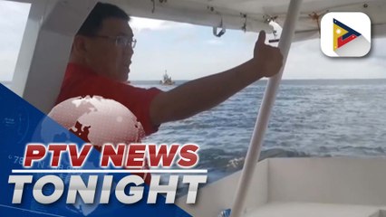 Rep. Wilbert Lee inspects the MT Terranova oil tanker sinking site