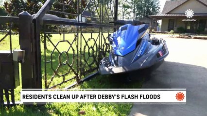 Residents clean up after Debby's flash floods