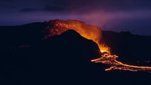 mixkit-lava-surrounding-a-volcano-during-eruption-49571-hd-ready