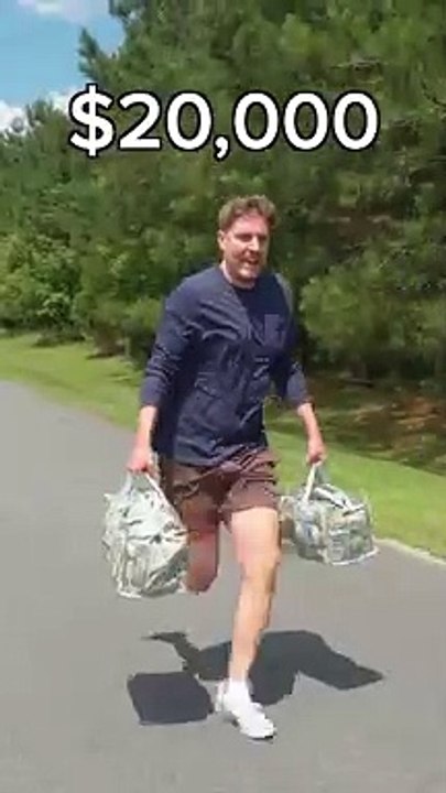 Mr beast running with dollars