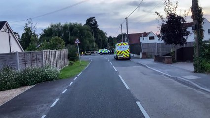 Police lock down road after man stabbed outside shop