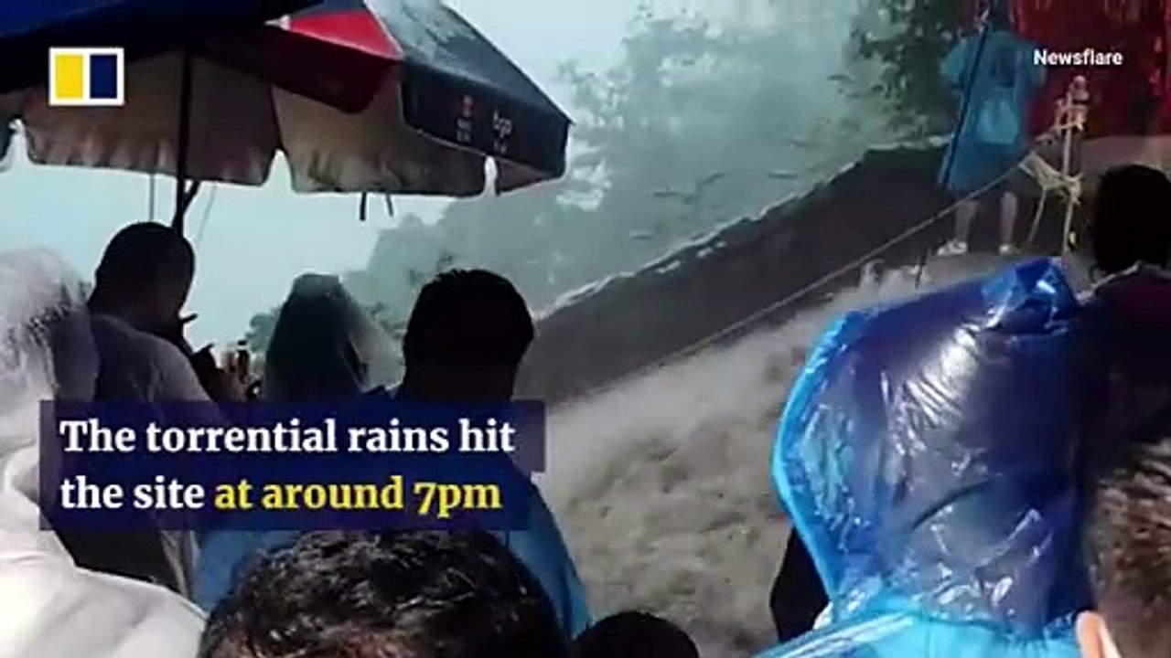 Visitors evacuated as heavy rain batters Chinese mountain