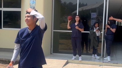 Boy trusts friend to hit the bottle on his head with football *INSTANT REGRET!*